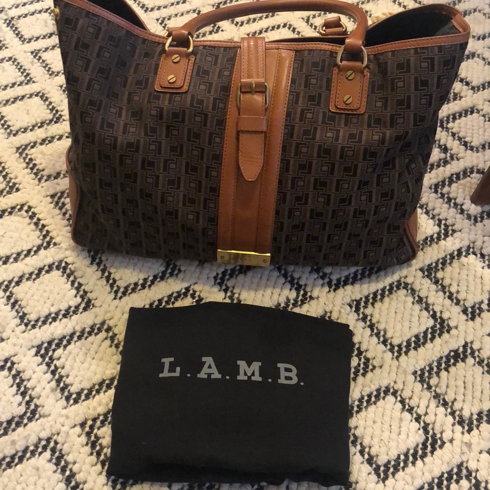 large tote bag from luxury handbag L.A.M.B. line.